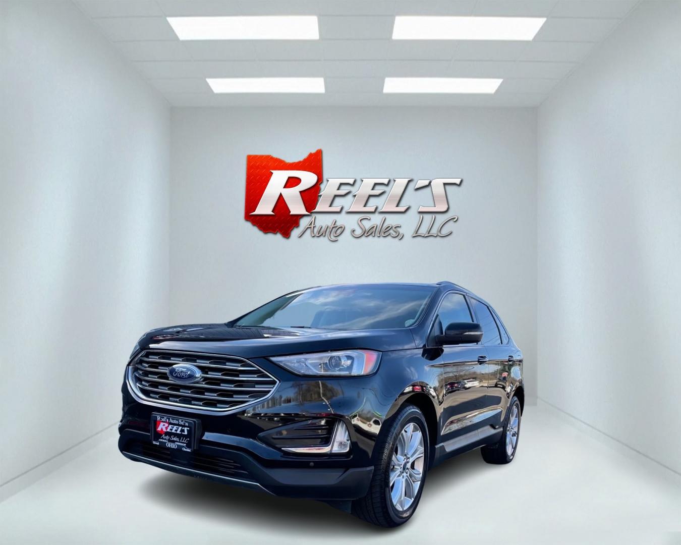 2020 Black /Beige Ford Edge Titanium AWD (2FMPK4K96LB) with an 2.0L I4 DOHC 16V Turbo engine, 8A transmission, located at 11115 Chardon Rd. , Chardon, OH, 44024, (440) 214-9705, 41.580246, -81.241943 - Photo#0